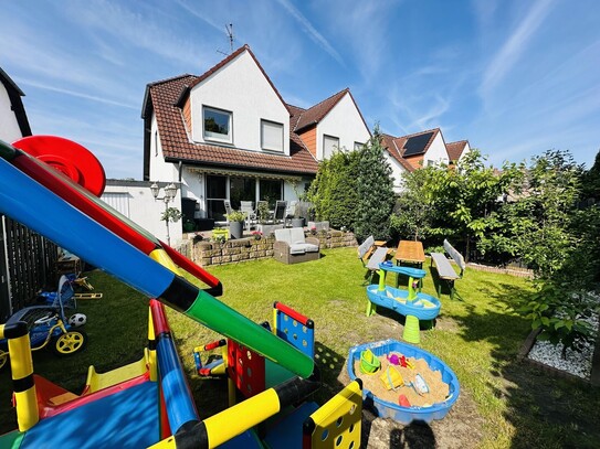 Charmante Doppelhaushälfte in Zentrumsnähe mit Garten, Garage und Einbauküche