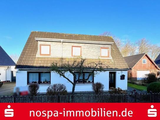 Beliebte Lage am Eiderdeich! Klassisches Einfamilienhaus mit Garage und PKW-Stellplatz