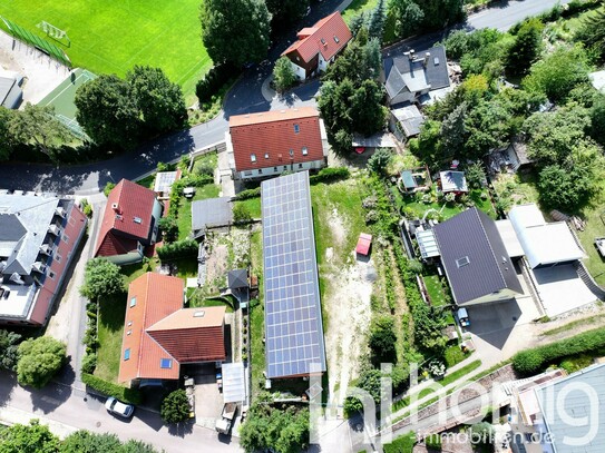 Attraktives Baugrundstück mit Carportanlage und ertragreicher Photovoltaik -Anlage