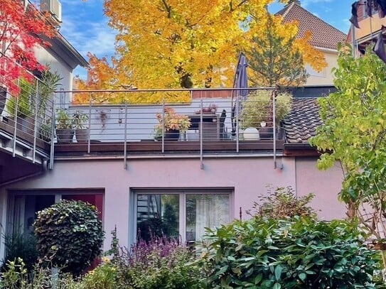 Aussergewöhnliche Maisonettewohnung in neuwertigem Zustand mit großer Südterrasse!