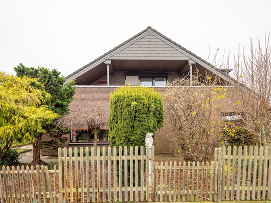 Gepflegte Eigentumswohnung mit großem Garten und Carport im schönen Berne