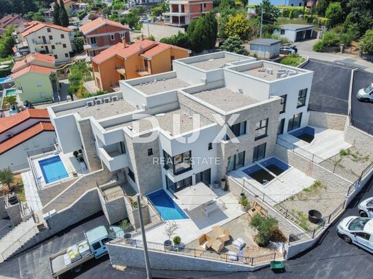 OPATIJA, LOVRAN – Exklusive zweistöckige Wohnung mit privatem Pool, nur 150 Meter vom Strand entfernt, Neubau