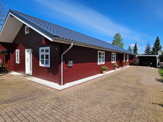 Wohnen mit nordischem Urlaubsflair! Familienfreundliches dänisches Blockhaus mit Einliegerwohnung.