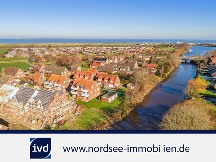 Neubau-Wohnung A+ mit 85 m² direkt am Wasser in Dornumersiel
