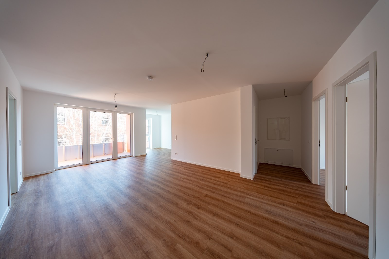Neubauwohnung mit Terrasse im Erstbezug / WBS mit besonderen Wohnbedarf erforderlich - Foto 1