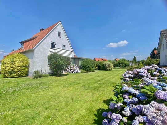 Einfamilienhaus mit schönem gepflegten Grundstück + Wintergarten, ruhig und zentral gelegen