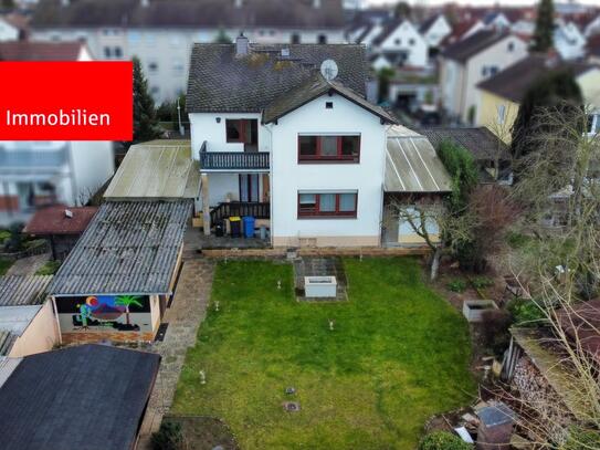 Zweifamilienhaus mit Traumgarten und vielen Optionen