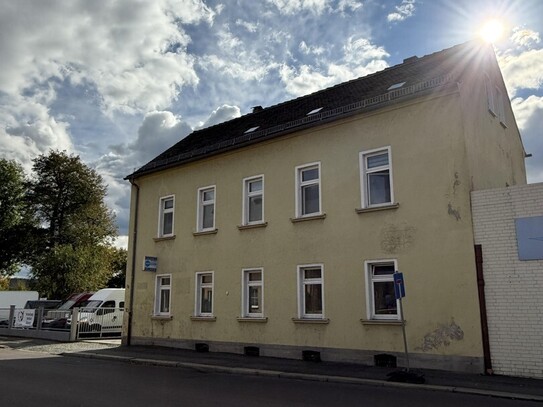 Mehrfamilienhaus mit Gewerbeeinheiten – Vielfältige Renditechance auf großzügigem Grundstück