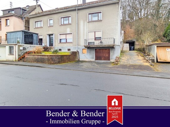 Solide Kapitalanlage: Mehrfamilienhaus mit 4 Wohneinheiten, Garagen und Garten!