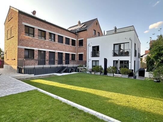 Exklusive und hochwertige 90qm EG-Wohnung mit großer Küche, Vollbad, große Süd-Terrasse in top Lage