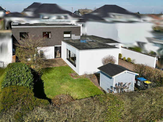 Im Silbernkamp: Individuelles Familienidyll mit außergewöhnlichem Grundriss, Garten und Hochkeller