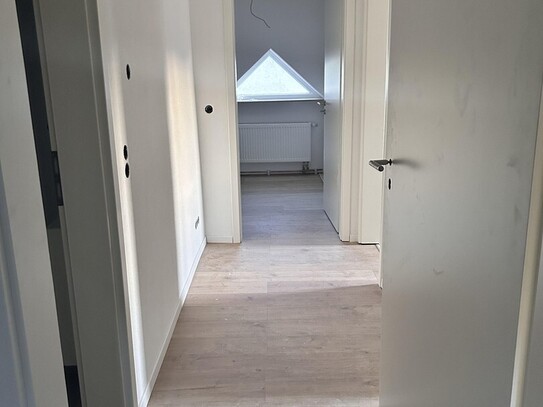 Sanierte Dachgeschosswohnung in Kernsaniertem Haus