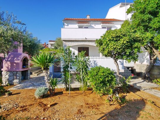 City of Krk. Semi-detached house with sea view, near the sea.