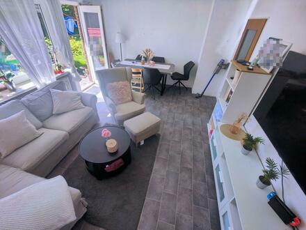Eine Charmante 3-Zimmer-Wohnung mit Terrasse, Garten und privater Garage wartet auf Sie!