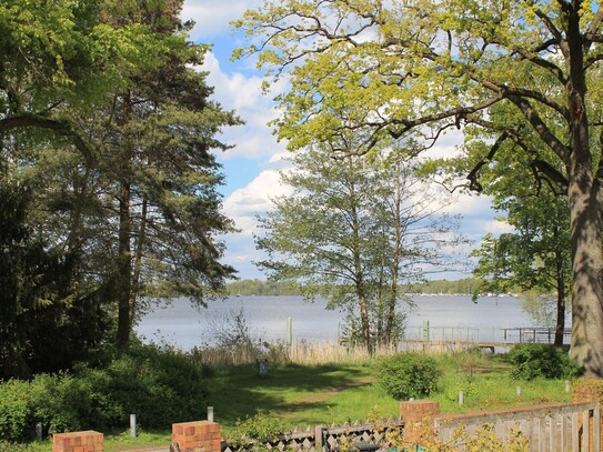 Teilbares Grundstück mit Seeblick und sanierungsbedürftigem Bestandsobjekt Top Lage. Neubau möglich