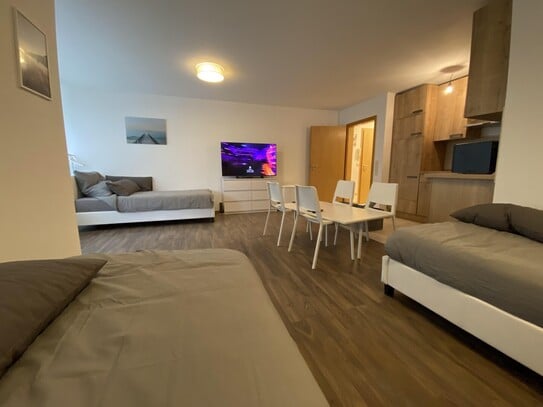 gemütliche 1,5-Zimmer-Apartment mit Terrasse und Stellplatz – möbliert.