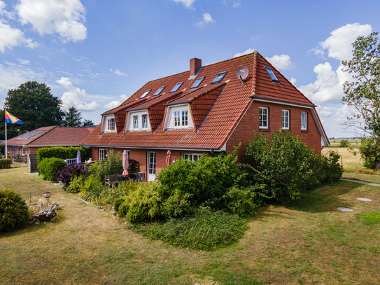 Herrlich gelegenes 6-Parteienhaus inkl. 4 Carports, 2 SP, 3 Terrassen - top vermietet!