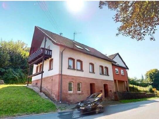 charmates Einfamilienhaus nebst Garage und Lagergebäude + Option auf Bauplatz