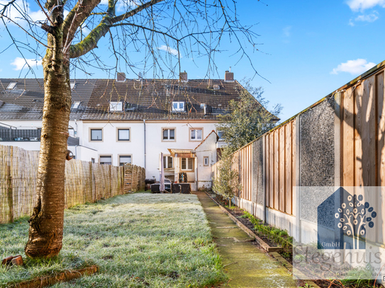 ***STEGEHUIS GMBH*** Gute Starterwohnung mit viel Volum: Reihenmittelhaus im Osten von Gronau