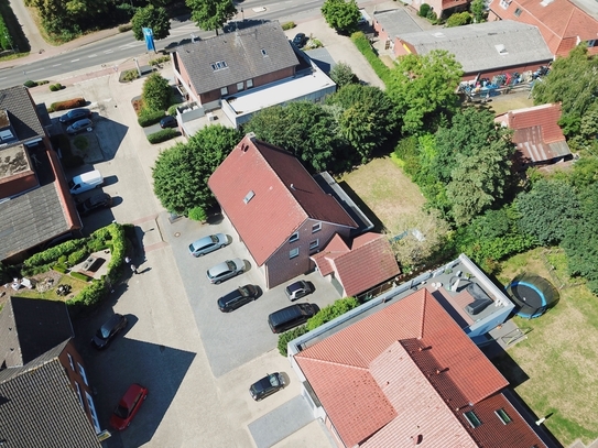 Einfamilienhaus mit Gewerbeeinheit im Erdgeschoss