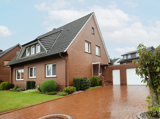 Modernisiertes Ein-/ Zweifamilienhaus auf sonnigem Grundstück in familienfreundlicher Siedlung