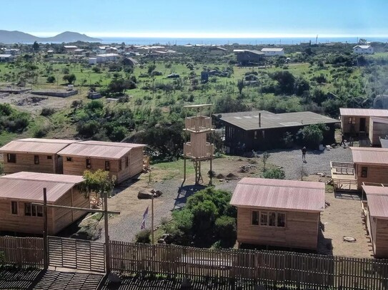 Ferienwohnanlage mit 8 Hütten + 1 Wohnhaus am Meer