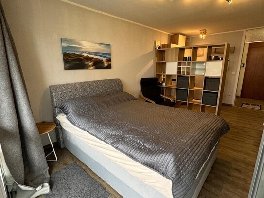 Möblierte, gepflegte 1-Zimmer-Wohnung mit optimaler Anbindung inkl. TG-Stellplatz