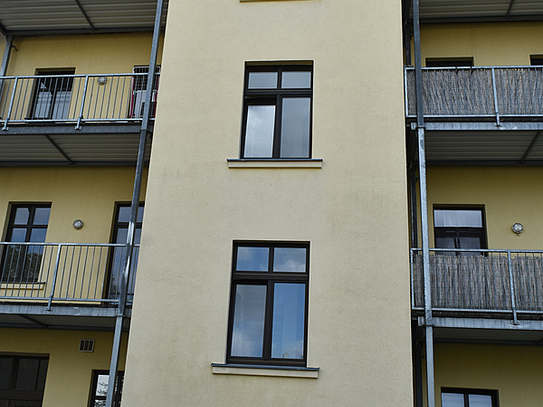 Gepflegtes Mehrfamilienhaus mit Balkonen in zentraler Lage