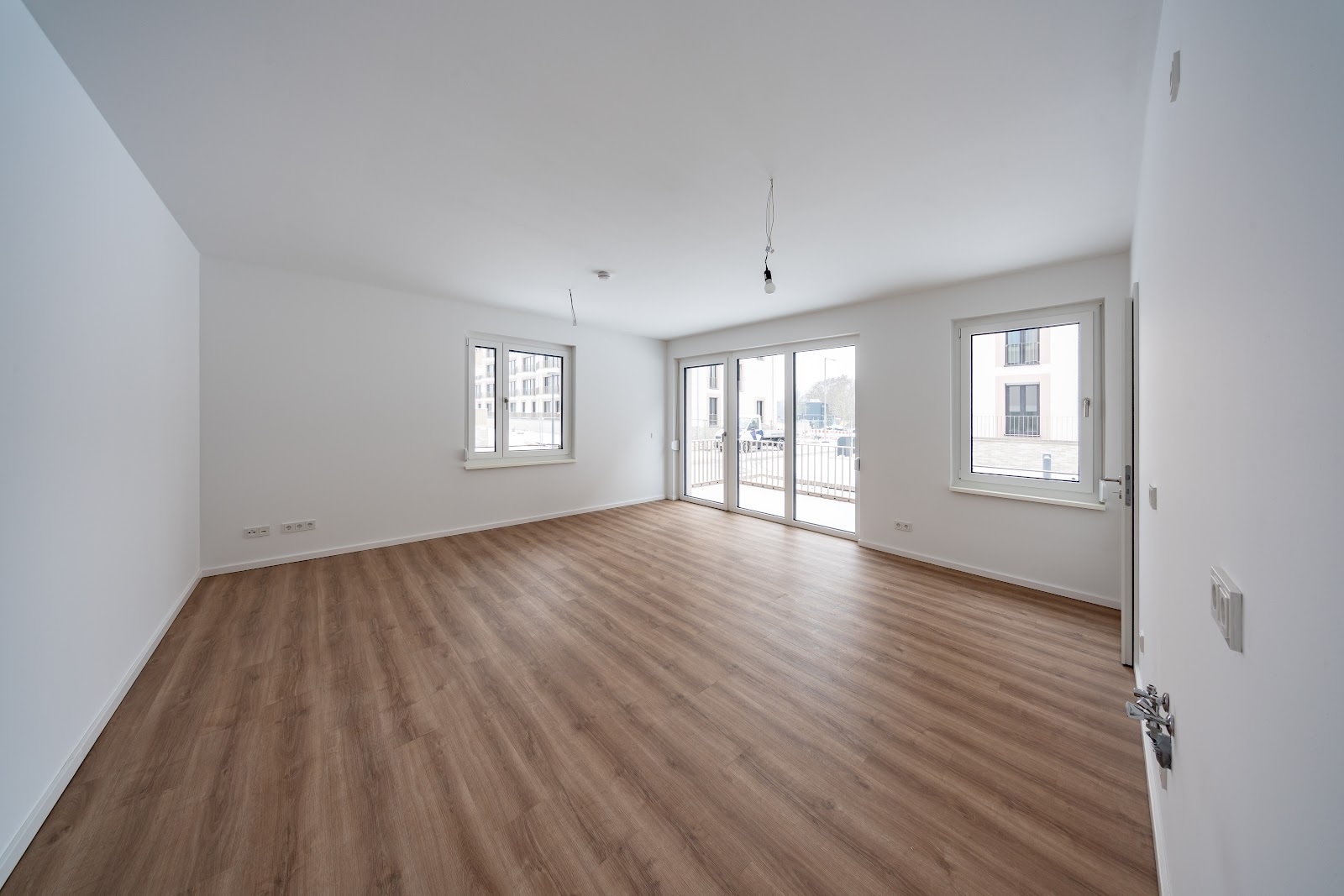 Neubauwohnung im Erstbezug mit Fußbodenheizung und Balkon / WBS 220 erforderlich - Photo 1