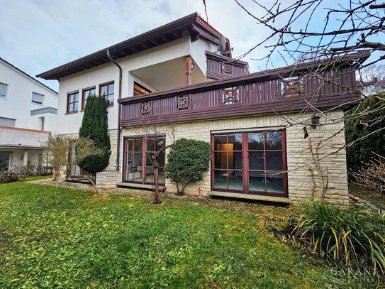 Besonderes Einfamilienhaus mit herrlicher Aussicht - Ihr neues Zuhause mit Gewerbemöglichkeit