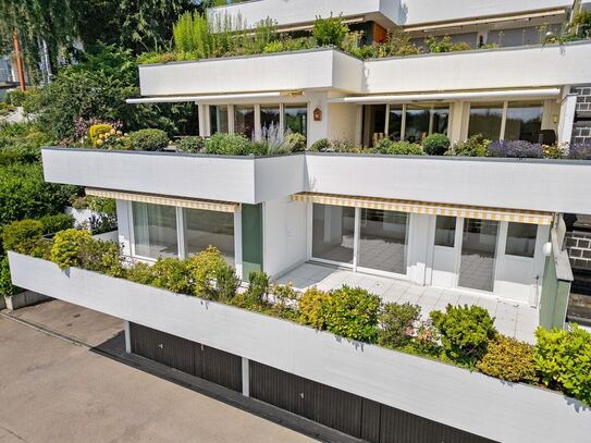 Viel Platz zum Wohnen - See- und Bergsicht attraktives Terrassenhaus in ruhiger Lage