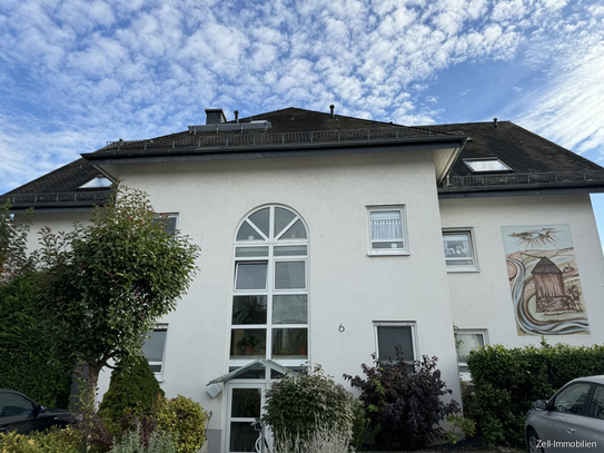 Attraktive Maisonettewohnung mit Balkon und zwei Stellplätzen in gepflegtem Mehrfamilienhaus in Oestrich