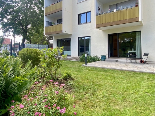 Moderne 3 Zimmer Wohnung mit Südwest Garten, Tiefgaragenstellplatz + zusätzlichen Büro +Garten