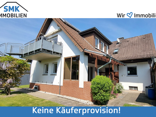 Modernisiertes Zweifamilienhaus mit Garten, Garage & Carport!
