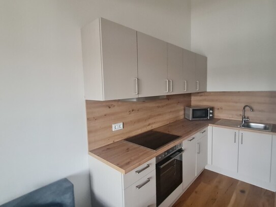 Charmante Dachgeschosswohnung mit Balkon – Ideal für Singles oder Paare!