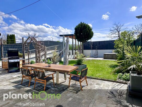 Stilvoller Rückzugsort mit Gartenidyll, Garage und Ausbaupotenzial!