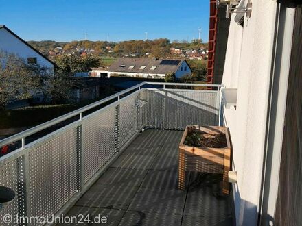 249.000,- für 8 7 m² Gartenwohnung mit herrlichen Sonnen-Balkon und Garage mit Satteldach