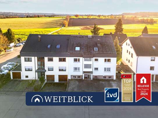 WEITBLICK: 7-Familienhaus in Feldrandlage!