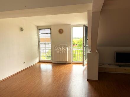 Bezugsfreie Dachgeschosswohnung mit Stellplatz