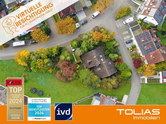 Idyllisch & vielseitig: EFH mit Einliegerwohnung, Hobbyraum, großem Garten, Wintergarten & 2 Garagen
