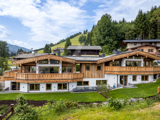 Miete: Möbliertes Neubau Chalet in Ausblicklage und unmittelbarer Pistennähe