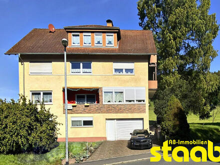 FREISTEHENDES 3-FAMILIENWOHNHAUS MIT EINLIEGERWOHNUNG UND GARAGE - STADTTEILRANDLAGE