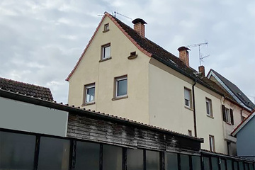 Ein kleines Wohnhaus mit ehemaliger Werkstatt