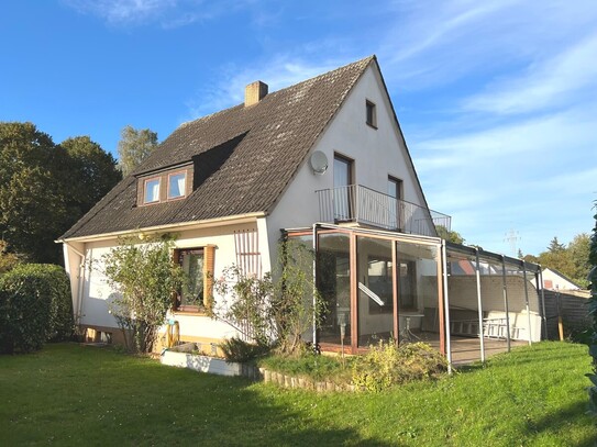 PURNHAGEN-IMMOBILIEN - Bremen-Farge in Wesernähe, gepflegtes, freistehendes 1-Fam.-Haus mit Garage