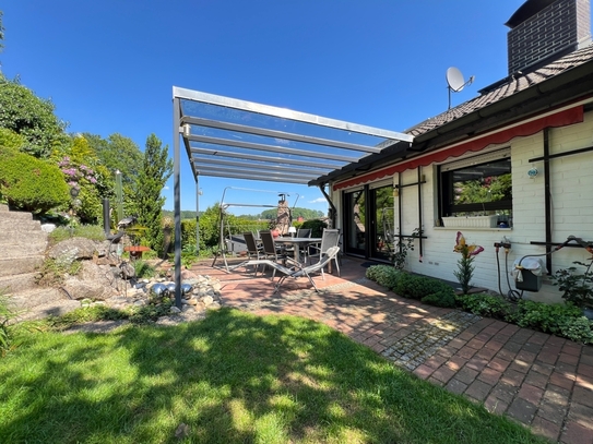 Einfamilienhaus in ruhiger Waldrandlage mit außergewöhnlichem Gartengrundstück in Rippenweier.