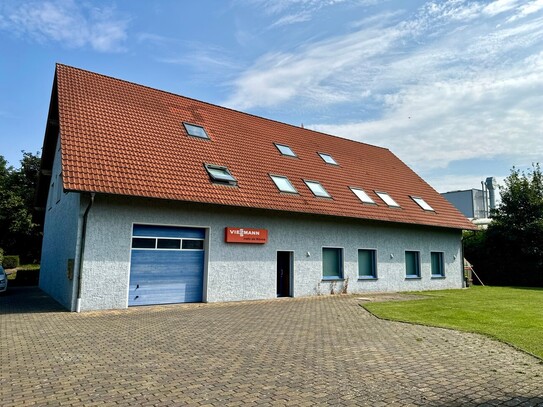 Mehrfamilienhaus mit großem Grundstück und integrierter Gewerbefläche in Wulferdingsen