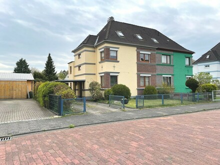 PURNHAGEN-IMMOBILIEN - Gepfl. Doppelhaushälfte mit vermieteter Einliegerwohnung in ruhiger Lage