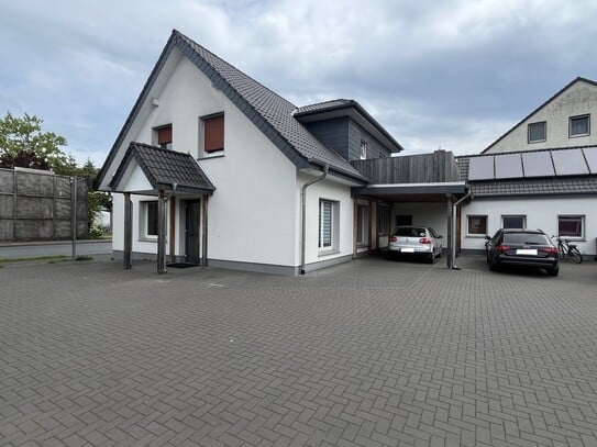 Zwei zum Preis von Einem! Vermietetes Mehrfamilienhaus + Bungalow mitten in Versmold