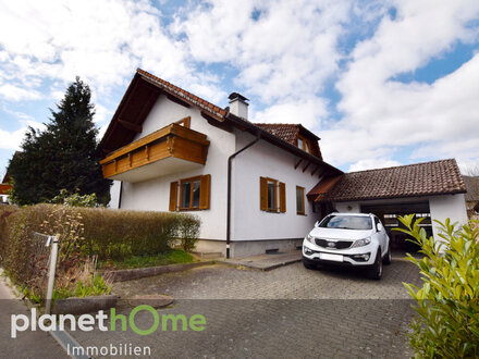 Einfamilienhaus mit grossem Garten und Garage