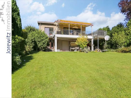 Familientipp in Bi-Hillegossen: Bungalow mit Garage, Photovoltaikanlage und schönem Garten